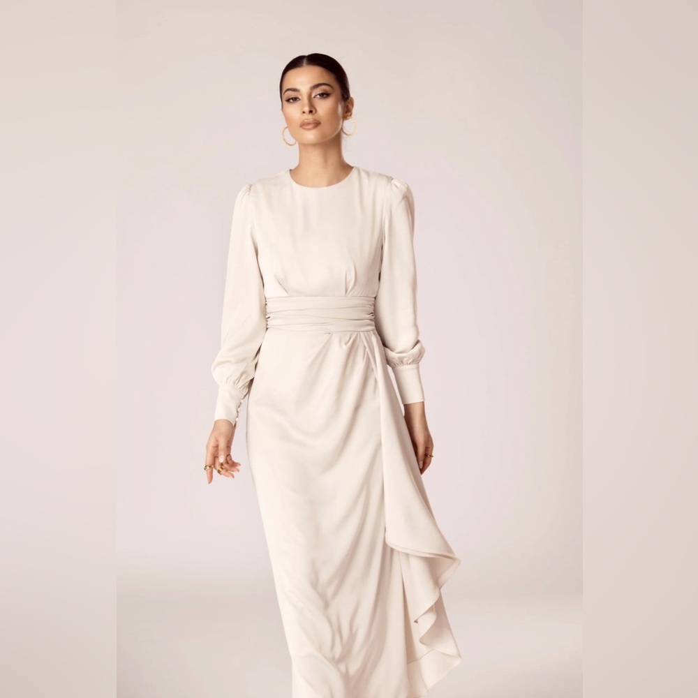 Veiled Collection Anabelle Pleated Waist Ruffle Maxi Dress in Sand Dollar